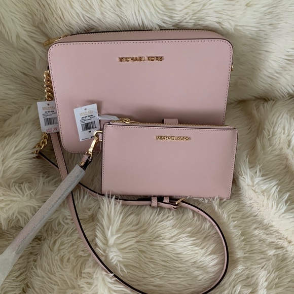 Michael Kors Handbags - MICHAEL KORS CROSSBODY & WRISTLET. NWT. “B…